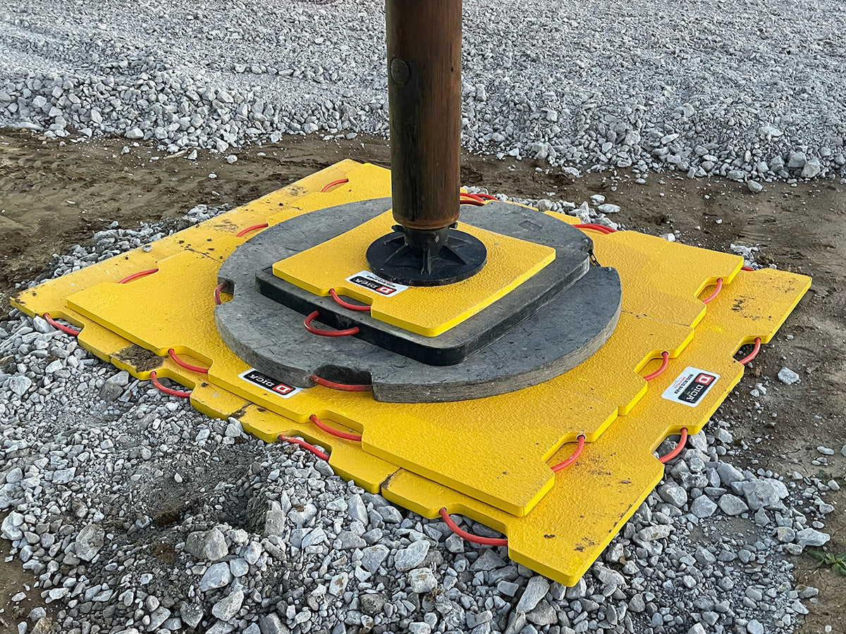 DICA FiberTech MultiPad system supporting a concrete pump truck outrigger on a job site