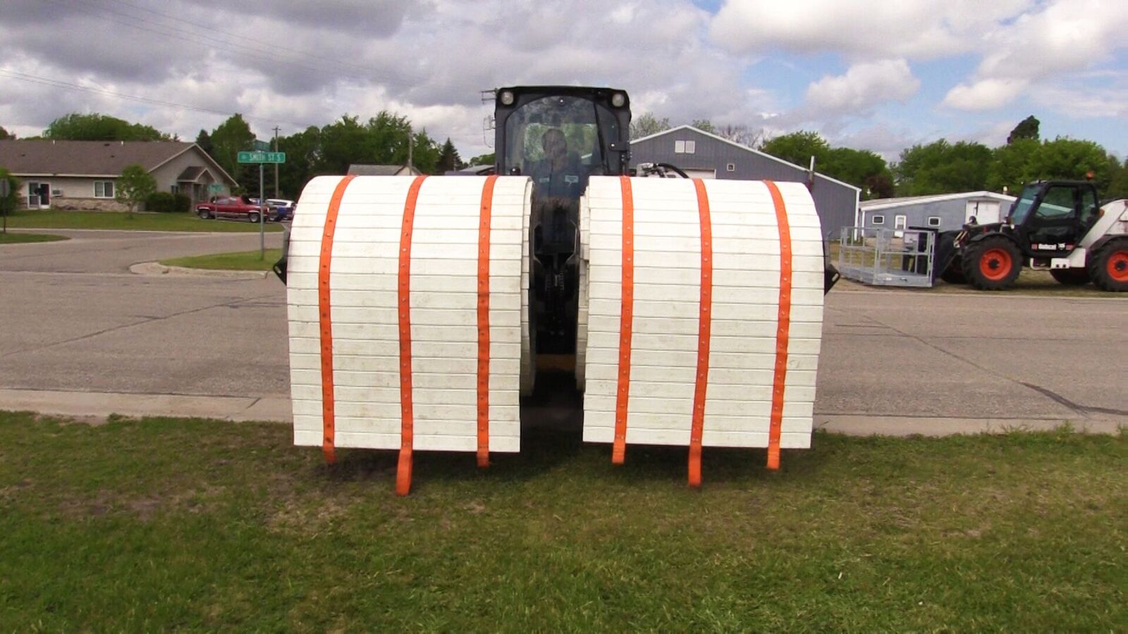 Rolled DICA SlatTrax ground protection roadway sections staged for deployment