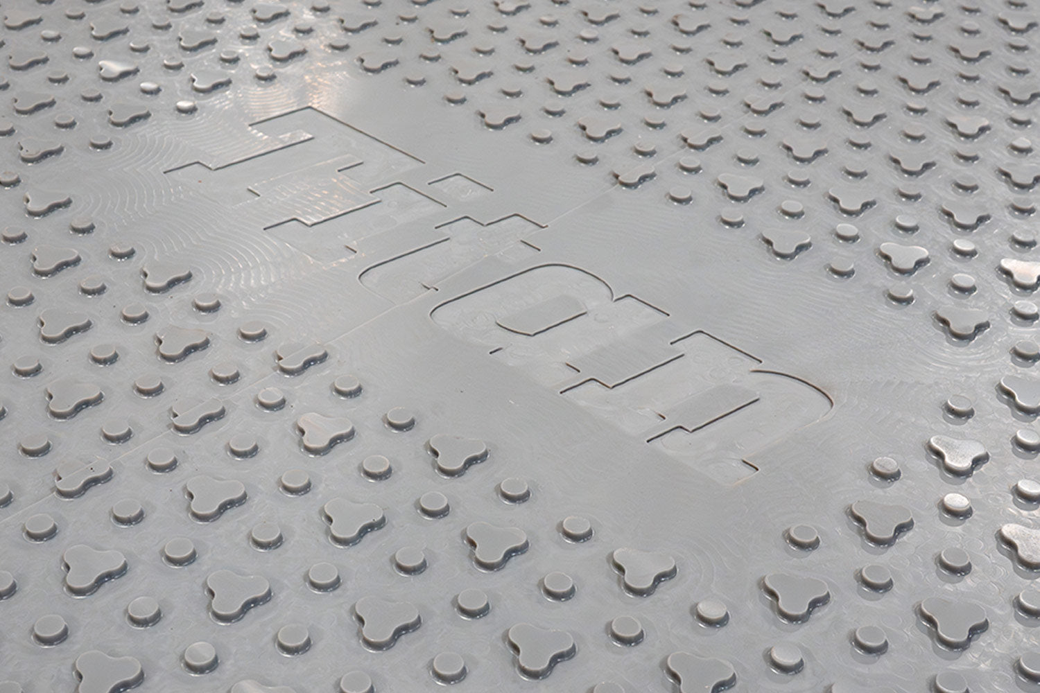 DICA Titan access mat tire traction surface with raised multidirectional nubs
