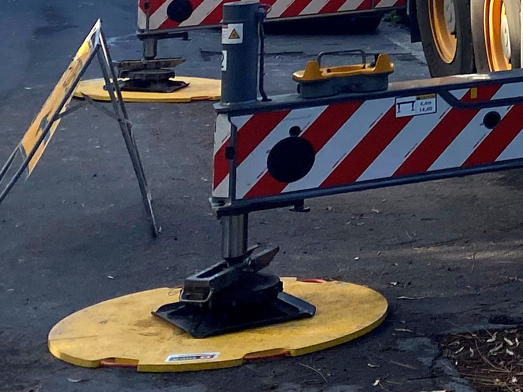 DICA FiberTech round outrigger pad distributing crane outrigger load over soft ground