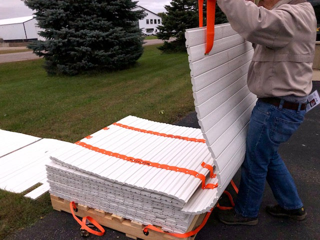 DICA SlatTrax temporary roadway unrolled to protect turf from equipment traffic