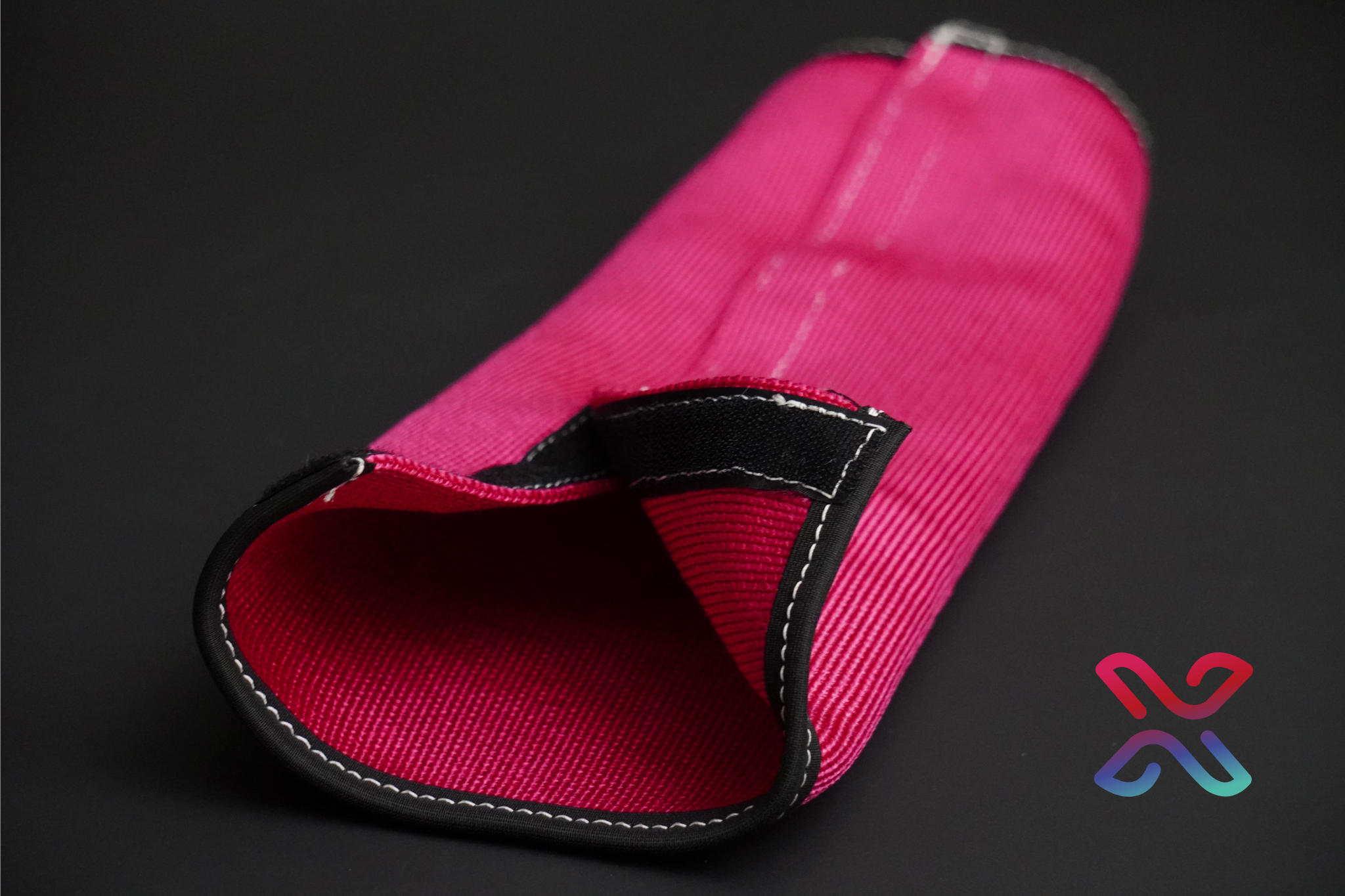 Extreema EP-C sleeve part-opened showing the full-length hook and loop closure strip